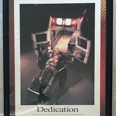 Framed Motivational Dedication Photo showing ambulance crew loading patient into rear of ambulance.