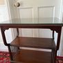 Mahogany table with glass top. Image 2