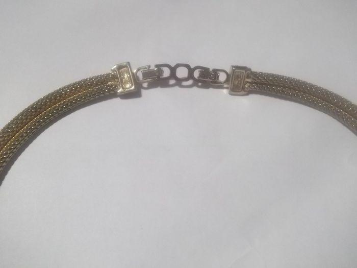 a christian dior necklace gold colour j