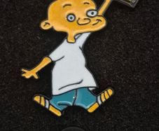 Johnny and plank ! pin back badge.