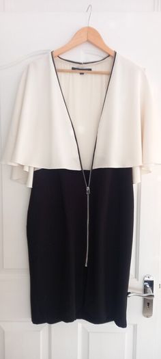 Cream/black dress with cape sleeves (french connection)