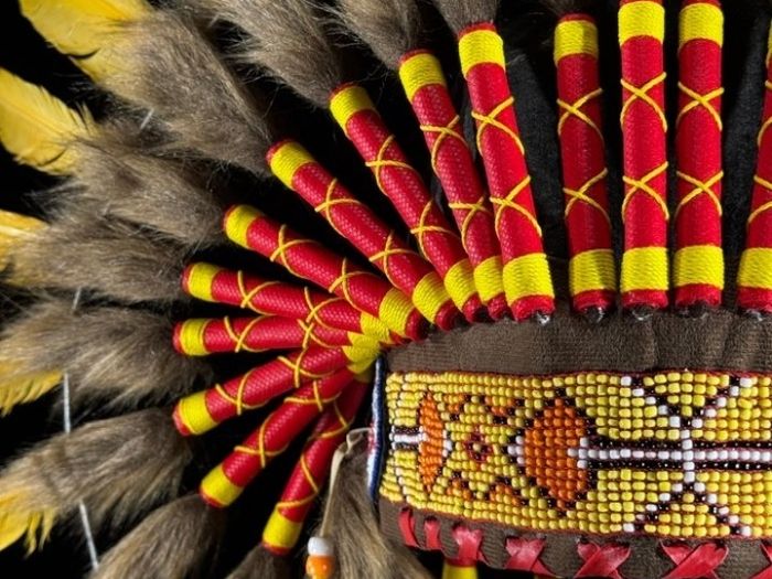 Large handmade Indian headdress on custom stand