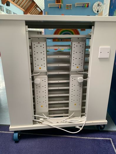 Large laptop storage and charging unit