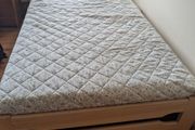 Wooden single bed