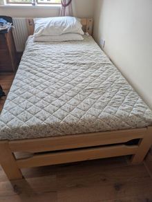Wooden single bed