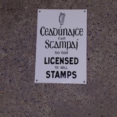Irish antique style Enamel and Metal Sign. Licensed to Sell Stamps