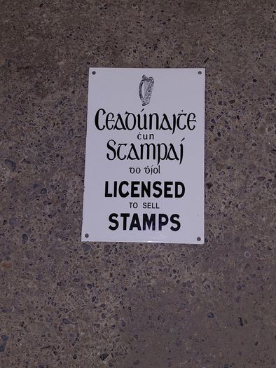 Irish antique style Enamel and Metal Sign. Licensed to Sell Stamps