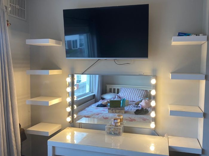 White dressing table with mirror, Hollywood lights, shelves and chair