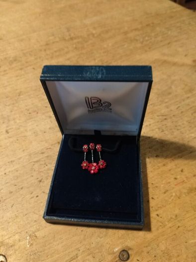 red poppy flower design Necklace  sold by independent jewelers like IB2 Jewellery Store. New in box.