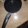 Brand new black saucepan with old lid Image 2