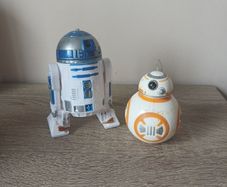 Star Wars R2-D2 and BB-8 figures with poster