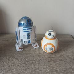 Star Wars R2-D2 and BB-8 figures with poster
