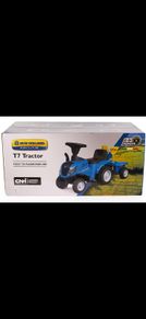New Holland T7 Foot-to-Floor Ride-On Tractor  Brand new and UNOPENED / SEALED IN ORIGINAL BOX.