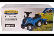 New Holland T7 Foot-to-Floor Ride-On Tractor  Brand new and UNOPENED / SEALED IN ORIGINAL BOX.