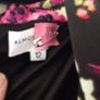 Black dress with flower design from Almost Famous Image 3