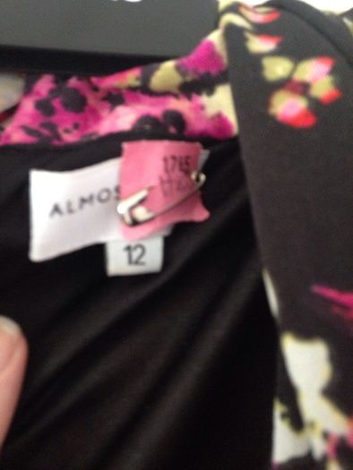 Black dress with flower design from Almost Famous