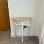 ornate half-moon console table with a granite top Image 2