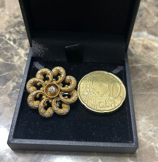 14kt gold pin wheel brooch