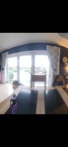 Large white bifold pvc door ,grey wrap on outside