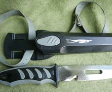 A Paget diving knife. Model Z16631. Complete with safety sheath and holster and rubber straps. (35 each)