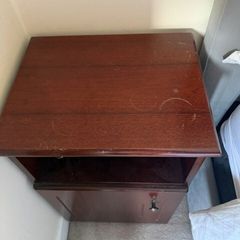 Dark wood bedside lockers with storage cupboard