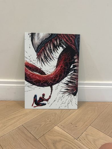 Spiderman swing from venom displate