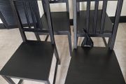 Black table with 4 matching chairs