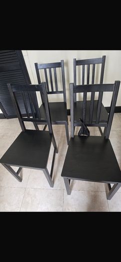 Black table with 4 matching chairs