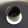 Small Black Pot with White Saucer Image 2