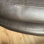 Large circular leather swivel chair and foot stool Image 5