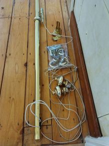 Brass coloured curtain track
