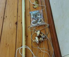 Brass coloured curtain track