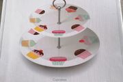 Creative Tops super white porcelain two-tier cake stand featuring a playful pastel cupcake pattern