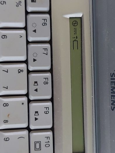 Rare Vintage Fujitsu Siemens Lifebook, E Series, FPC07048B Part number CP127259, Running Windows 2000 Professional, uses 3.5 floppy disk, 20GB HDD, amd all the connecting Ports from 30 years ago Era