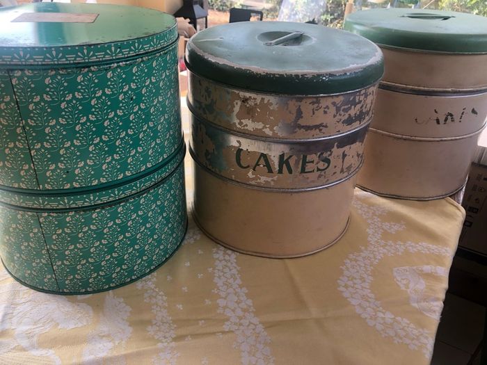 selection of vintage cake storage tins with lids