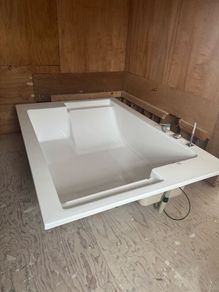 Brand new two person bath with fittings
