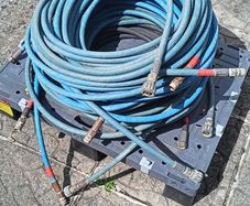Powerwashing Hoses in Average condition