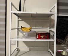 Expandable microwave shelf