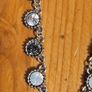 This matching silver-tone crystal necklace and bracelet set features alternating clear and black round stations with textured bezels.  SEE PHOTOS FOR SAME. Image 4