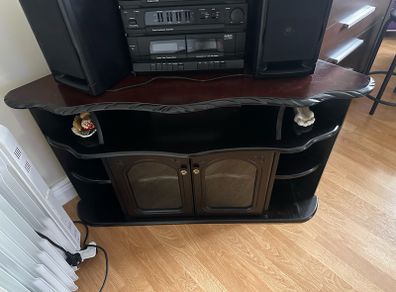 Traditional dark wood corner TV/display unit in good used condition.