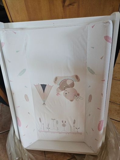 Cot top changer with firm sided changing mat