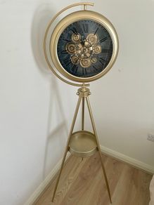Tripod standing brass clock  beautiful furniture