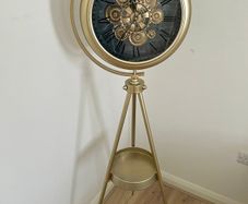 Tripod standing brass clock  beautiful furniture