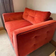 DFS Grand Designs orange velvet cuddler armchair/small sofa