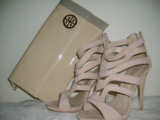 Nice shoes and a handbag .