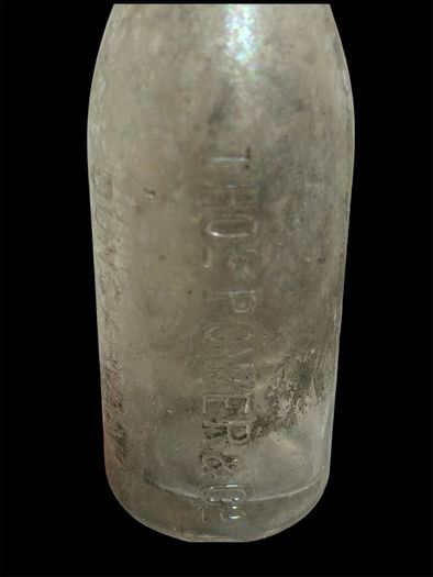 old glass mineral bottle