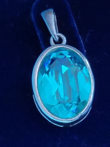 Vintage Sterling silver pendant with blue crystal