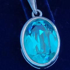 Vintage Sterling silver pendant with blue crystal