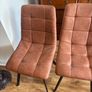 Four brown leather dining chairs Image 4