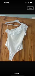 white bodysuit